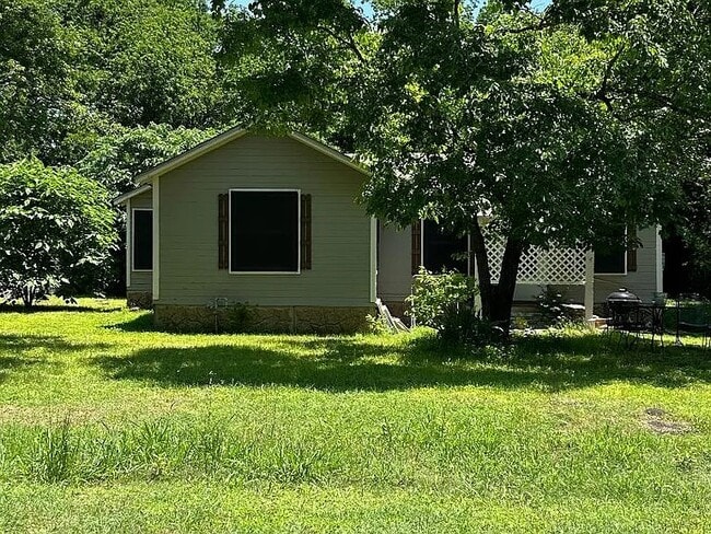 property at 103 S San Antonio St