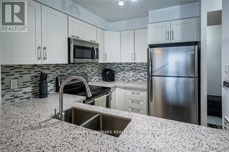 2177-2177 Burnhamthorpe Rd W in Mississauga, ON - Building Photo - Building Photo