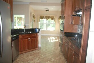 6935 Brescia Way in Orlando, FL - Building Photo - Building Photo