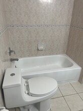 13211 11th Ave, Unit 1 in College Point, NY - Building Photo - Building Photo