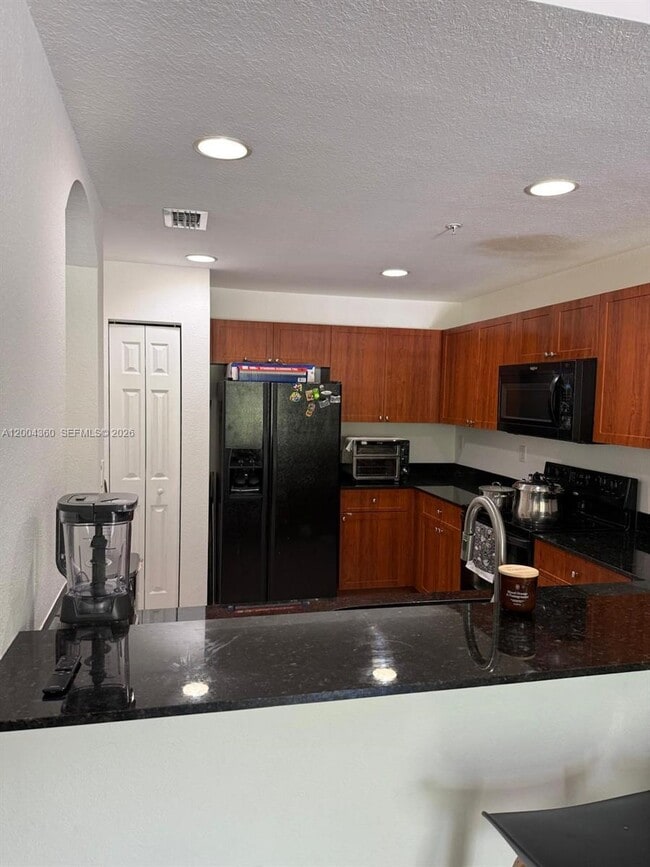 property at 8999 NW 107 Ct