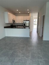 7712 Stone Crk Trl in Kissimmee, FL - Building Photo - Building Photo