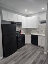 803 Hempstead Turnpike in Elmont, NY - Building Photo - Building Photo
