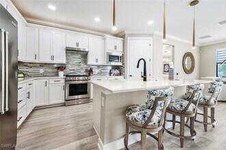 6754 Pennyroyal Dr in Naples, FL - Building Photo - Building Photo