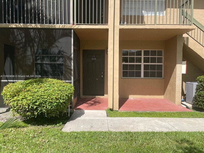property at 10476 NW 8th St
