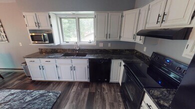 325 Westbrook Dr, Unit Executive Airplane Suite in Oshkosh, WI - Building Photo - Building Photo