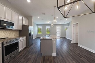 7055 Carrickbend Ln in Orlando, FL - Building Photo - Building Photo