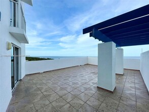 7600 Collins Ave, Unit 1013 in Miami Beach, FL - Foto de edificio - Building Photo