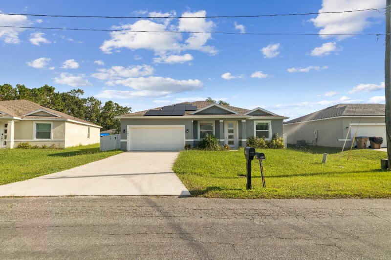 969 Cambridge Ct in Poinciana, FL - Building Photo