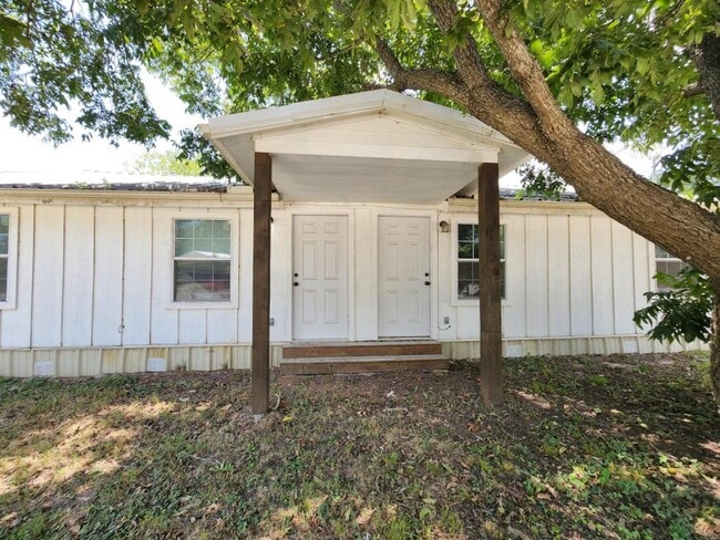property at 1301 W 14th St