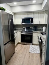 1566 SE Royal Green Cir in Port St. Lucie, FL - Building Photo - Building Photo