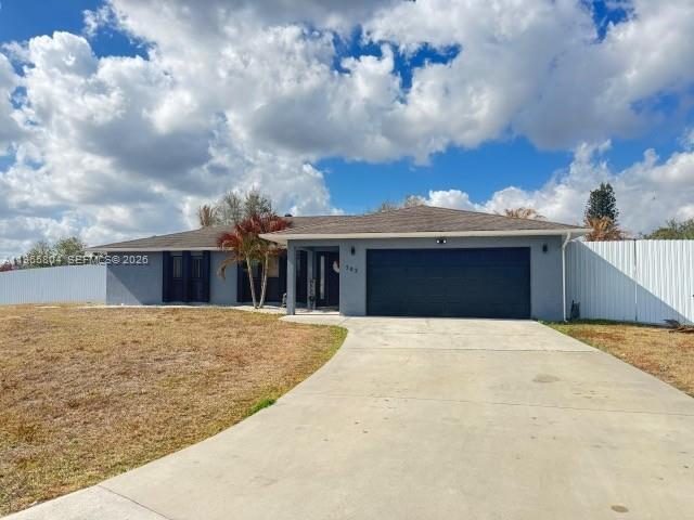 702 NW Orchid St in Port St. Lucie, FL - Building Photo - Building Photo