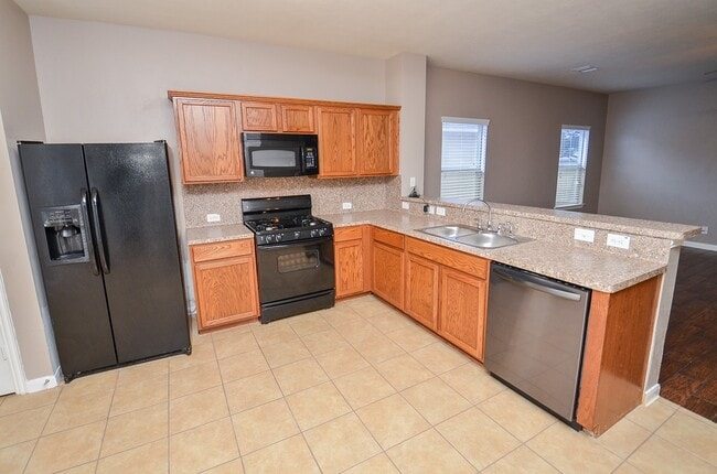 10806 Woodwind Shadows Dr