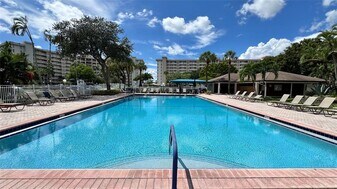 2650 S Course Dr, Unit 401 in Pompano Beach, FL - Building Photo