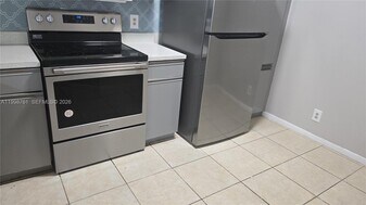 8901 Wiles Rd in Coral Springs, FL - Building Photo