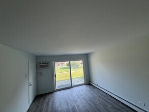 90 Olesen Dr-Unit -101 in Naperville, IL - Building Photo - Building Photo