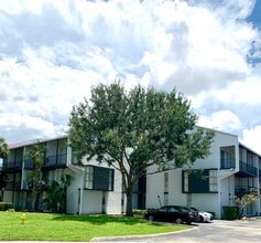 The Palms At Forest Hills - 2930 Forest Hills Blvd. in Coral Springs, FL - Building Photo - Building Photo