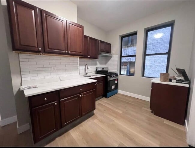 property at 5704 Hudson Ave