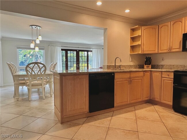 1154 Cooper Dr in Naples, FL - Foto de edificio - Building Photo