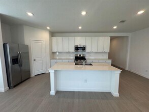 10321 Woodhill Spa Ln in Cleveland, TX - Building Photo - Building Photo