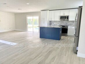 585 Queens Mirror Cir in Casselberry, FL - Building Photo - Building Photo