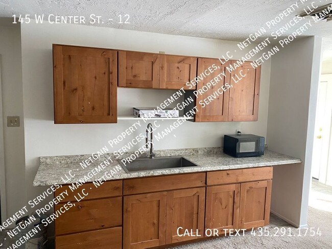 property at 145 W Center St