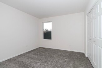 208 Cooper St in Plano, IL - Building Photo - Building Photo