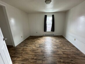 107 W Pulteney St in Corning, NY - Building Photo - Building Photo