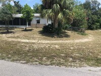 9598 River Rd in Spring Hill, FL - Foto de edificio - Building Photo