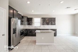 1869 Cayman Cove Cir in St. Cloud, FL - Building Photo - Building Photo