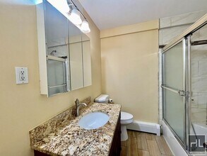 Large 1 bedroom with private patio in Queens, NY - Building Photo - Building Photo