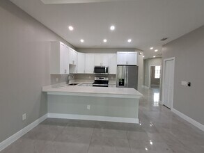 213 Hightower Ave S in Lehigh Acres, FL - Building Photo - Building Photo