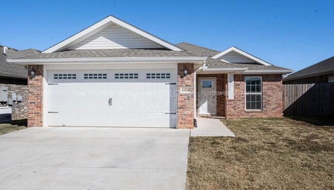 property at 6110 NW McClellen St