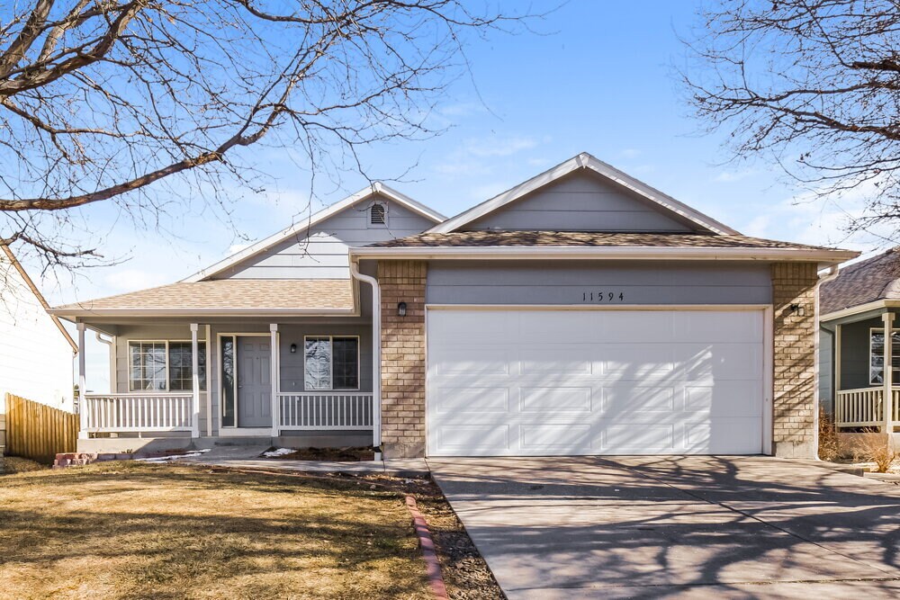 11594 Oswego St in Henderson, CO - Building Photo