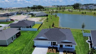 2440 BOWLING Ter in Okahumpka, FL - Building Photo - Building Photo