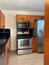 8740 N Sherman Cir in Miramar, FL - Building Photo - Building Photo