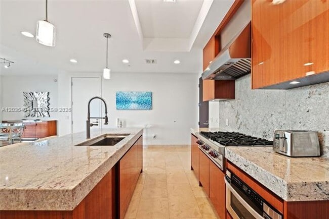 property at 9705 Collins Ave