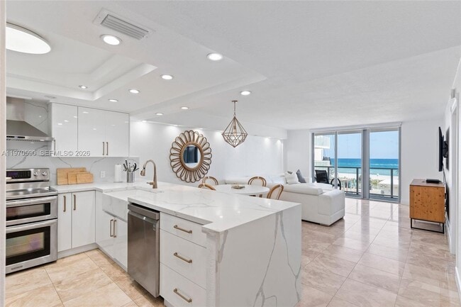 property at 5701 Collins Ave