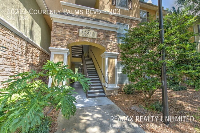property at 10213 Courtney Palms Blvd
