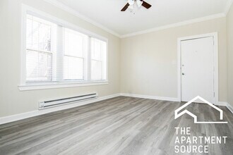 648.5 W Roscoe St, Unit 1N in Chicago, IL - Building Photo - Building Photo