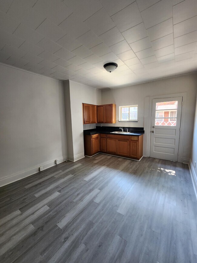 property at 7311 1/2 Burton St