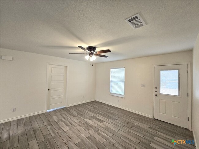 property at 907 E 3rd St