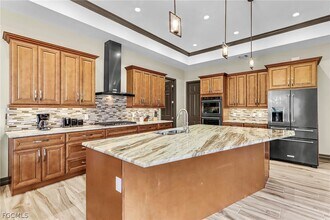 6142 Calusa Rdg Trl in Bokeelia, FL - Building Photo - Building Photo