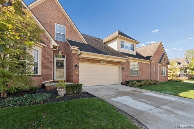48551 Oak Bridge Dr, Unit 61 in Canton Township, MI - Foto de edificio - Building Photo