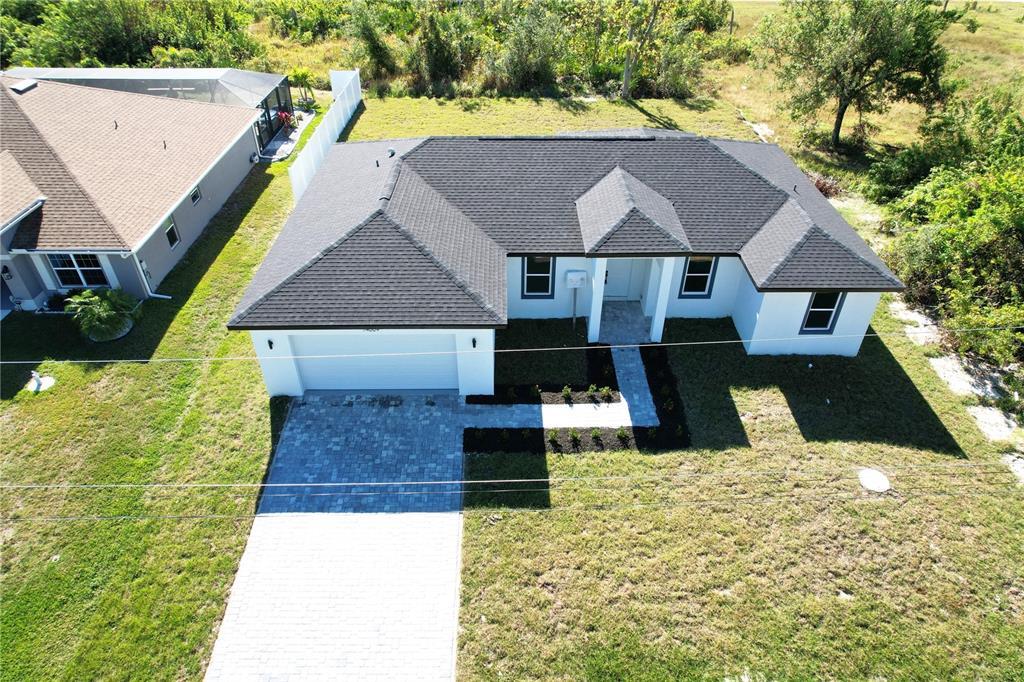 14009 Banos Ave in Port Charlotte, FL - Building Photo