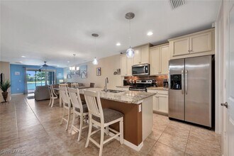 14940 Edgewater Cir in Naples, FL - Building Photo - Building Photo