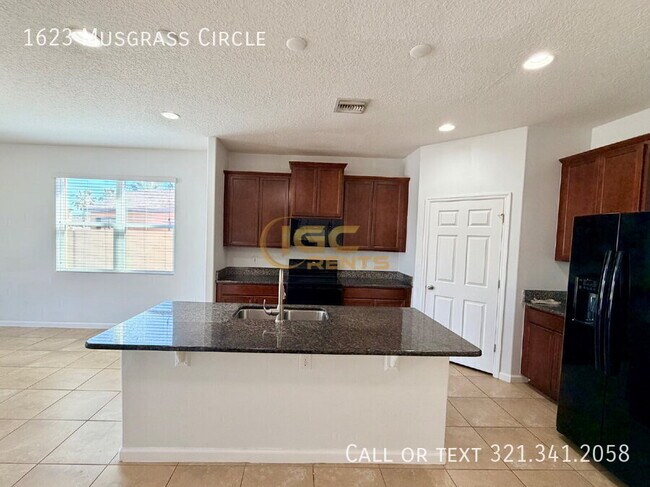 1623 Musgrass Cir in West Melbourne, FL - Building Photo - Building Photo