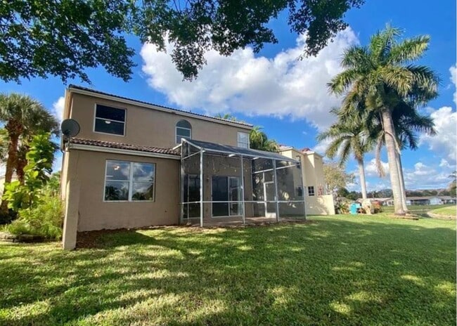 599 NW 87th Ter in Coral Springs, FL - Foto de edificio - Building Photo