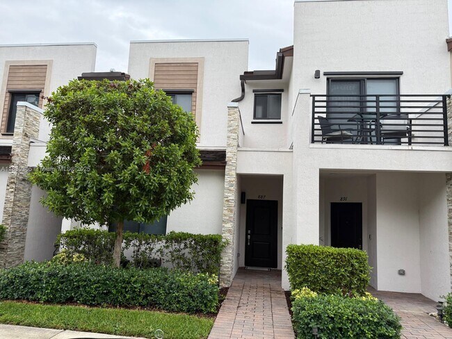 property at 887 NE 211th St