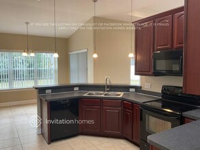 12840 Helen Dr in Grand Island, FL - Building Photo - Building Photo